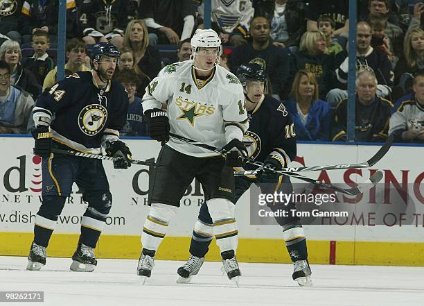 Darryl Sydor and Andy McDonald of the St. Louis Blues defend against Jamie Benn of the Dallas Stars on April 03, 2010 at Scottrade Center in St....