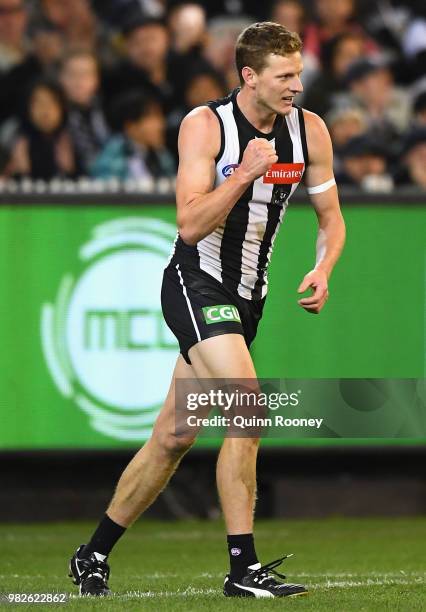 Will Hoskin-Elliott of the Magpies celebrates kicking a goal during the round 14 AFL match between the Collingwood Magpies and the Carlton Blues at...