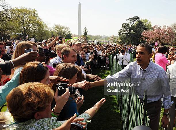 President Barack Obama greets guests during the annual White House Easter Egg Roll at the South Lawn April 5, 2010 in Washington, DC. The White House...