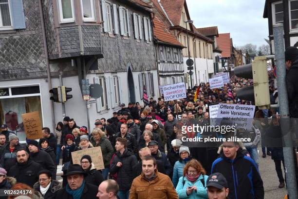 The "Frauenbuendnis Kandel" marches through the town under the motto "Sicherheit fuer uns und unsere Kinder" from the Drogeriemarkt store where Mia...