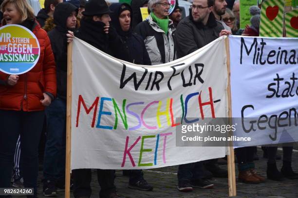 Supoporters of the group "Aufstehen gegen Rassismus" protesting during a demonstration by the "Frauenbuendnis Kandel" in Kandel, Germany, 28 Janaury...