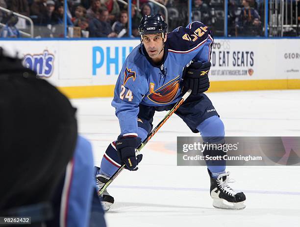 Chris Chelios of the Atlanta Thrashers gets set for a faceoff against the New York Rangers at Philips Arena on March 12, 2010 in Atlanta, Georgia.