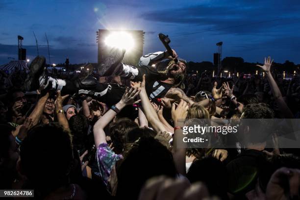 French band Shaka Ponk performs during a concert at the Solidays music festival on June 23, 2018 at the hippodrome de Longchamp in Paris.