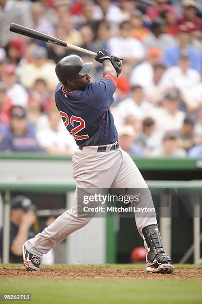 Bill Hall of the Boston Red Sox takes a swing during a spring training baseball game against the Washington Nationals on April 3, 2010 at Nationals...