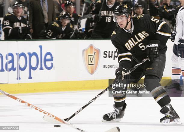 Matt Niskanen of the Dallas Stars handles the puck against the Edmonton Oilers on April 2, 2010 at the American Airlines Center in Dallas, Texas.