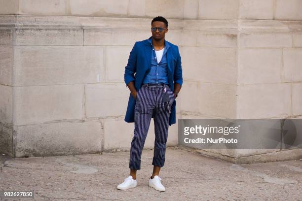 Gust is seen during Paris Men's Fashion Week Spring/Summer 2019 in Paris, France, on June 22, 2018.