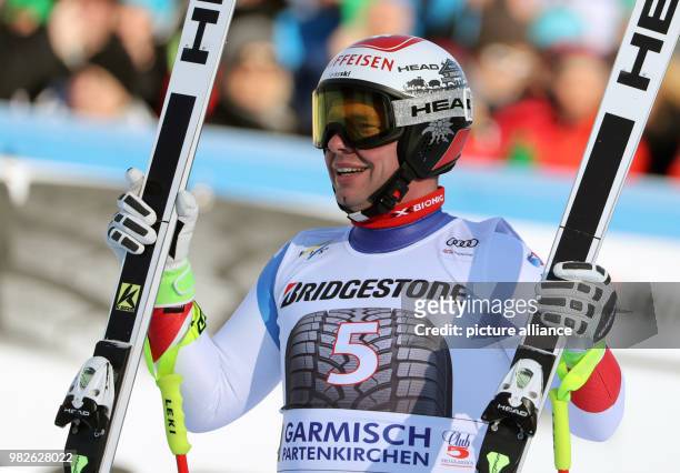 Beat Feuz celebrates his win in the men's downhill event at the Ski World Cup in Garmisch-Partenkirchen, Germany, 27 Janaury 2018. Photo: Stephan...