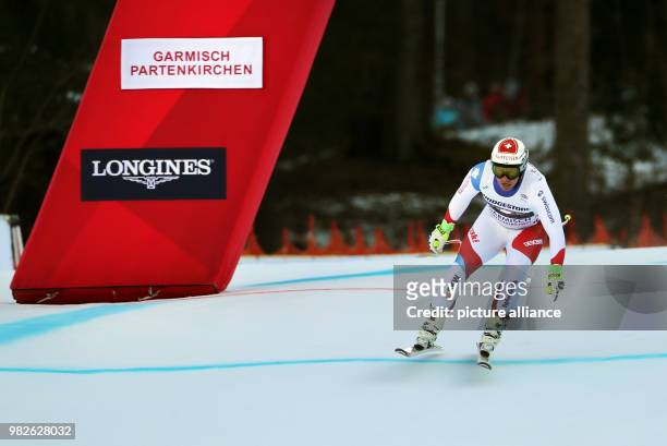Beat Feuz arrives at the finish line during the men's downhill event at the Ski World Cup in Garmisch-Partenkirchen, Germany, 27 Janaury 2018. Photo:...