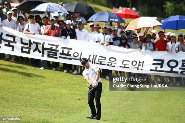 Choi Min-Chul of South Korea plays a shot on the 18th hole during the final round of the Kolon Korea Open Golf Championship at Woo Jeong Hills...