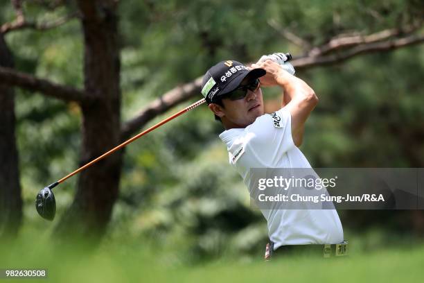 Choi Min-Chul of South Korea plays a tee shot on the 6th hole during the final round of the Kolon Korea Open Golf Championship at Woo Jeong Hills...