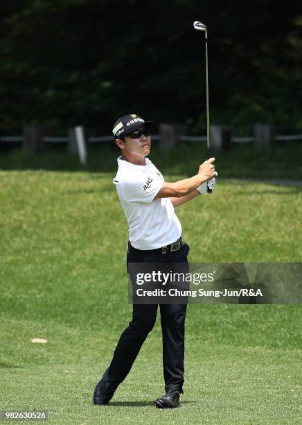 Choi Min-Chul of South Korea plays shot on the 8th hole during the final round of the Kolon Korea Open Golf Championship at Woo Jeong Hills Country...