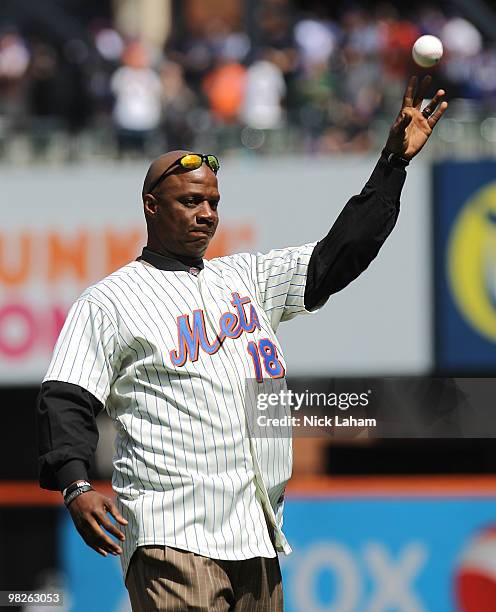 Former New York Mets player, Darryl Strawberry throws out the ceremonial first pitch prior to the game between the New York Mets and the Florida...