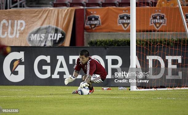 Goalkeeper Nick Rimando of Real Salt Lake makes a save against the Houston Dynamo on April 1, 2010 in Houston, Texas.