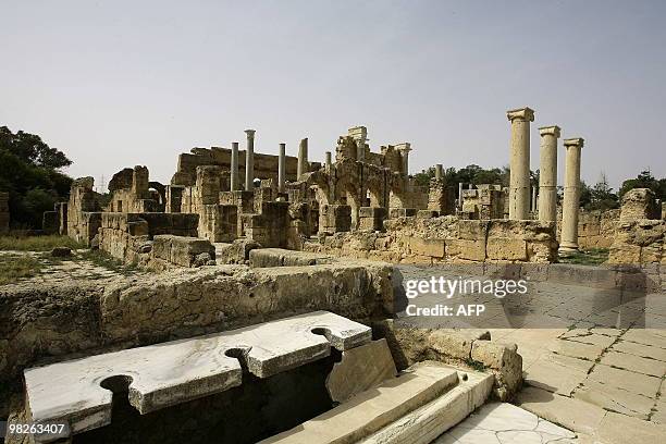Partial view shows the public toilets at the historical site of Leptis Magna, listed as World Heritage, in the Libyan coastal city of Lebda on March...