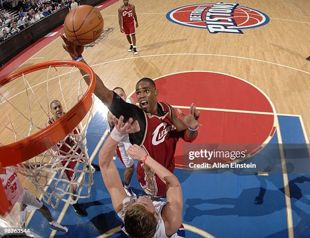 Antawn Jamison of the Cleveland Cavaliers shoots a layup against Jonas Jerebko of the Detroit Pistons during the game at the Palace of Auburn Hills...