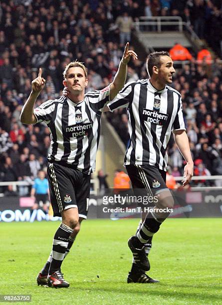 Peter Lovenkrands celebrates with Jose Enrique after scoring from the penalty spot during the Coca Cola Championship match between Newcastle United...