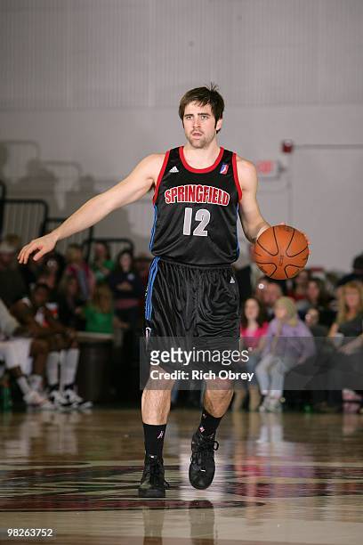 Kyle McAlarney of the Springfield Armor moves the ball up court during the game against the Maine Red Claws at the Portland Expo on March 21, 2010 in...
