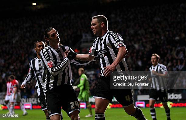 Newcastle United captain Kevin Nolan celebrates with Andy Carroll after scoring the second Newcastle goal during the Coca-Cola Championship game...