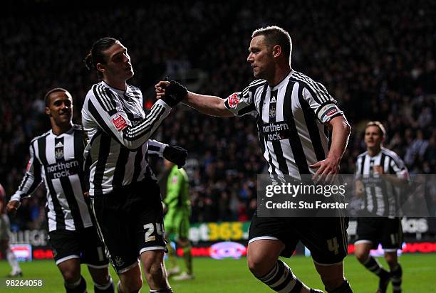 Newcastle United captain Kevin Nolan celebrates with Andy Carroll after scoring the second Newcastle goal during the Coca-Cola Championship game...