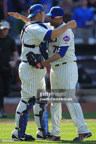 Francisco Rodriguez of the New York Mets celebrates victory over the Florida Marlins with team mate Rod Barajas during their Opening Day game at Citi...
