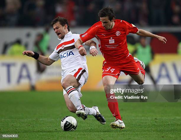 Florian Lechner of St. Pauli and Martin Harnik of Fortuna battle for the ball during the Second Bundesliga match between Fortuna Duesseldorf and FC...