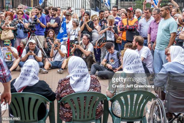 The press conference and photographers at the Mothers of the Plaza de Mayo Asociacion Madres de Plaza de Mayo weekly march protest.