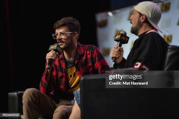 Actor Grant Gustin and Kevin Smith speak on stage during ACE Comic Con at WaMu Theatre on June 23, 2018 in Seattle, Washington.