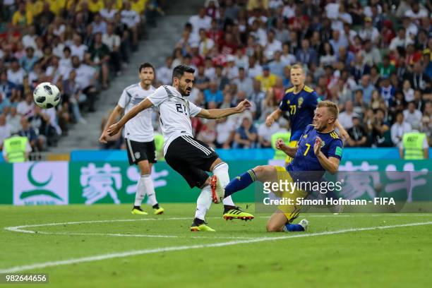 Ilkay Guendogan of Germany is challenged by Sebastian Larsson of Sweden during the 2018 FIFA World Cup Russia group F match between Germany and...