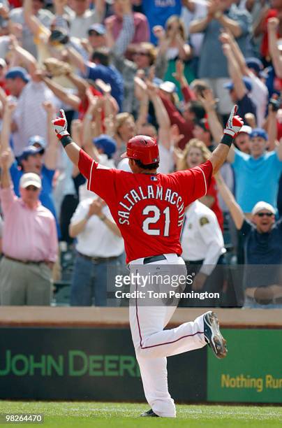 Catcher Jarrod Saltalamacchia of the Texas Rangers celebrates a walkoff RBI against the Toronto Blue Jays in the bottom of the ninth inning on...
