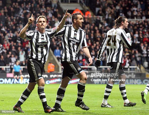 Peter Lovenkrands of Newcastle United celebrates with Jose Enrique after scoring from the penalty spot during the Coca Cola Championship match...