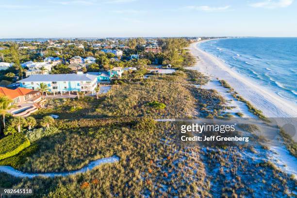 Florida, Anna Maria Island, Holmes Beach, Natural dunes and beachfront homes.