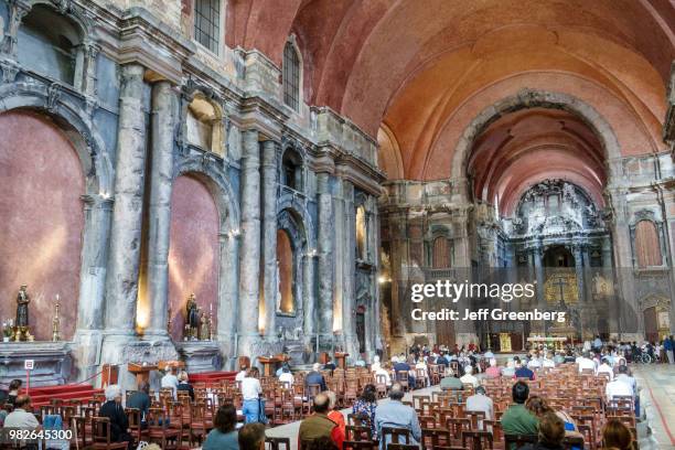 Portugal, Lisbon, Rossio, Igreja de Sao Domingos, celebrating mass.