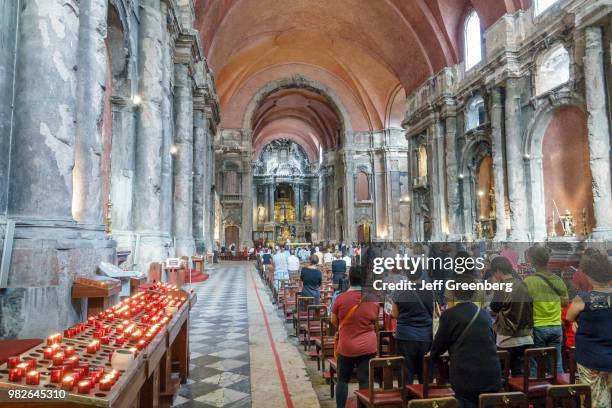 Portugal, Lisbon, Rossio, Igreja de Sao Domingos, celebrating mass.