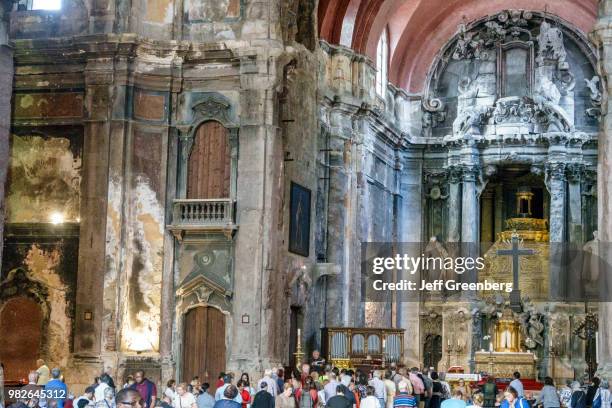 Portugal, Lisbon, Rossio, Igreja de Sao Domingos, celebrating mass.