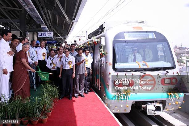 Union Urban Development Minister S Jaipal Reddy and Delhi Chief Minister Sheila Dikshit flag off a train to launch the Delhi Metro's Inderlok-Mundka...