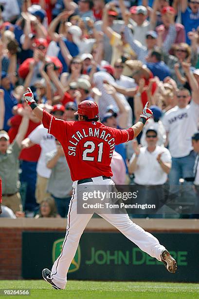 Catcher Jarrod Saltalamacchia of the Texas Rangers celebrates a walkoff RBI against the Toronto Blue Jays in the bottom of the ninth inning on...