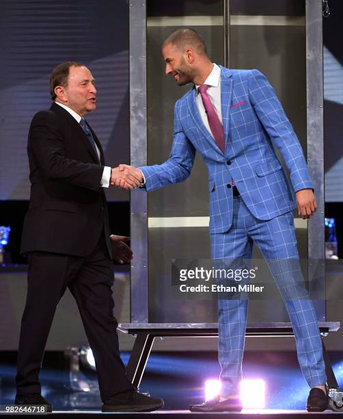 Commissioner Gary Bettman is greeted by llusionist Darcy Oake during the 2018 NHL Awards presented by Hulu at The Joint inside the Hard Rock Hotel &...