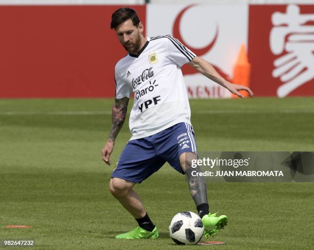 Argentina's forward Lionel Messi attends a training session at the team's base camp in Bronnitsy, near Moscow, Russia on June 24, 2018 ahead of the...