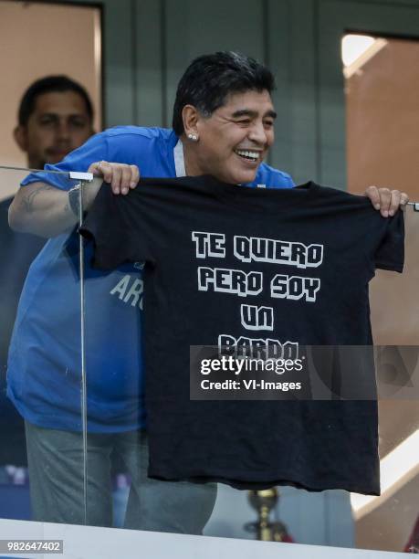 Diego Mardona shows a shirt I love you but I'm a bard during the 2018 FIFA World Cup Russia group D match between Argentina and Croatia at the...