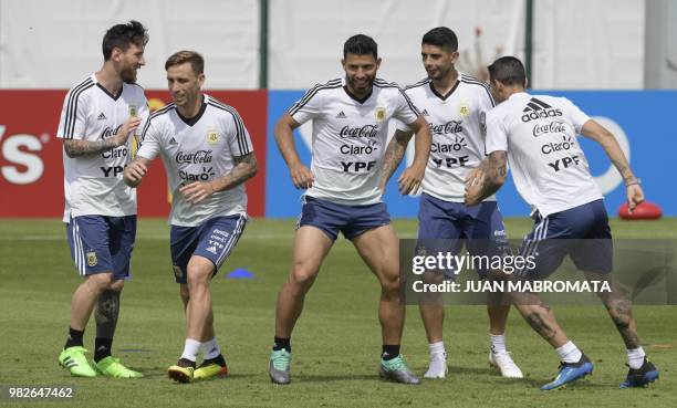 Lionel Messi, Lucas Biglia, Sergio Aguero, Ever Banega and Angel Di Maria attend a training session at the team's base camp in Bronnitsy, near...