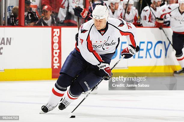 Defenseman Joe Corvo of the Washington Capitals skates with the puck against the Columbus Blue Jackets on April 3, 2010 at Nationwide Arena in...