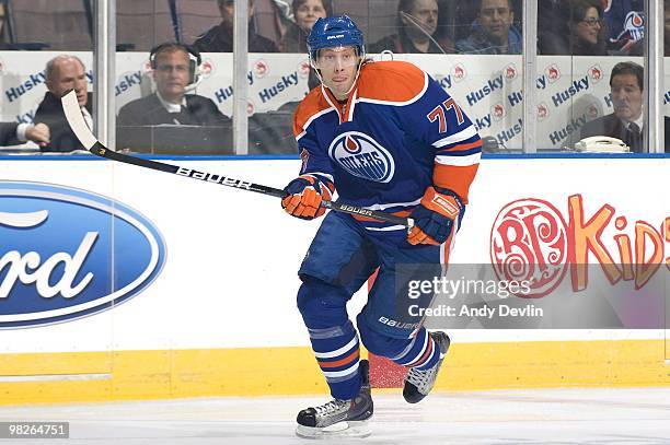 Tom Gilbert of the Edmonton Oilers follows the play against the Anaheim Ducks at Rexall Place on March 26, 2010 in Edmonton, Alberta, Canada.