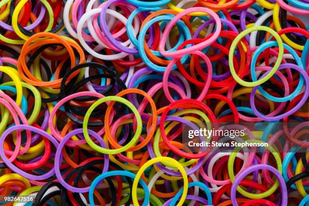 rubber bands 2 - rubber band stock pictures, royalty-free photos & images