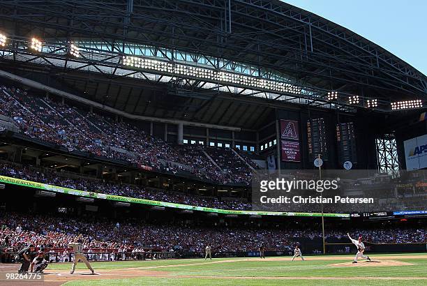 Starting pitcher Dan Haren of the Arizona Diamondbacks throws the first pitch of the game to Tony Gwynn of the San Diego Padres during the Opening...