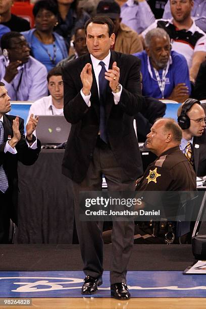 Head coach Mike Krzyzewski of the Duke Blue Devils reatcs while taking on the West Virginia Mountaineers during the National Semifinal game of the...