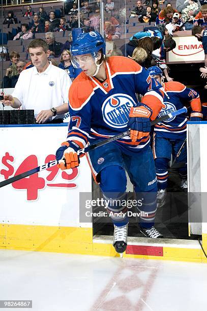 Tom Gilbert of the Edmonton Oilers steps on to the ice before a game against the Anaheim Ducks at Rexall Place on March 26, 2010 in Edmonton,...