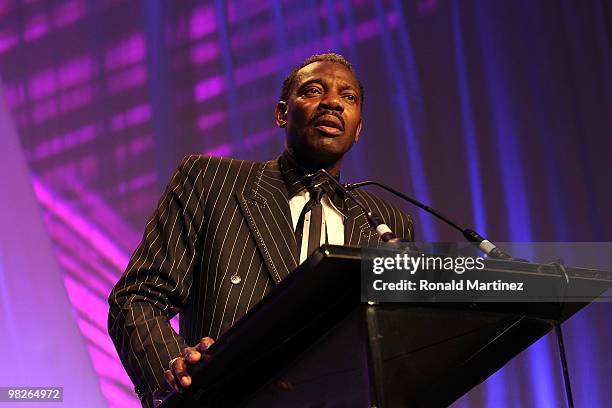 Rawlston Charles, father of Tina Charles of the Connecticut Huskies, accepts the 2010 Naismith Women's College Player of the Year award during the...