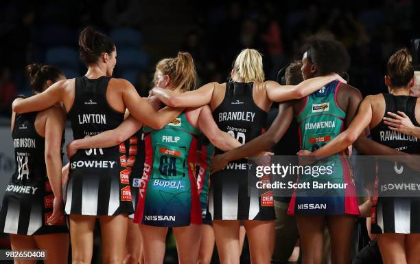 Players form a huddle after the round eight Super Netball match between Magpies and the Vixens at Margaret Court Arena on June 24, 2018 in Melbourne,...