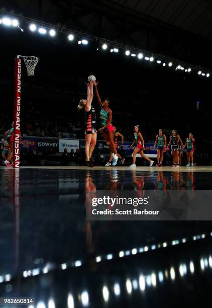 Caitlin Thwaites of the Magpies and Kadie-Ann Dehaney of the Vixens compete for the ball during the round eight Super Netball match between Magpies...