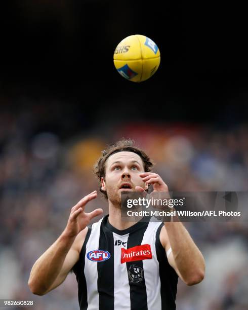 Matthew Scharenberg of the Magpies in action during the 2018 AFL round 14 match between the Collingwood Magpies and the Carlton Blues at the...